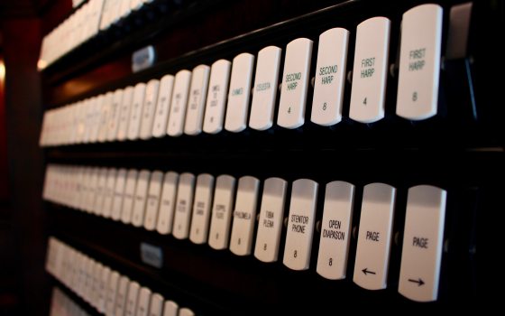 a close up of organ keys